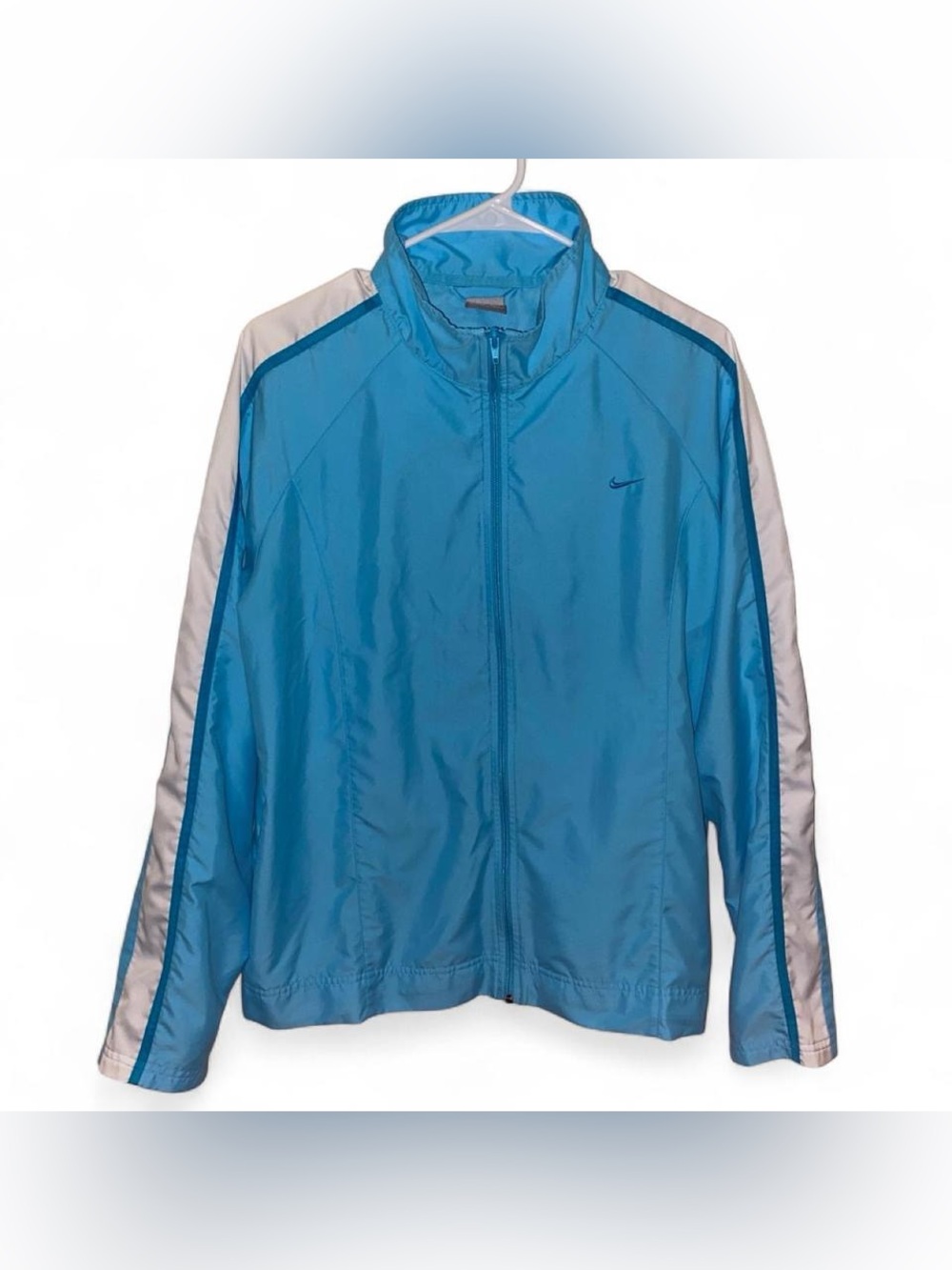 Nike Woman’s Turquoise Zip Up Track Jacket with White and Blue Sleeve Panels